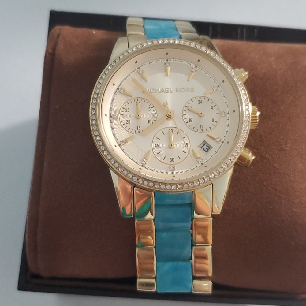 Gold and turquoise Michael Kors watch